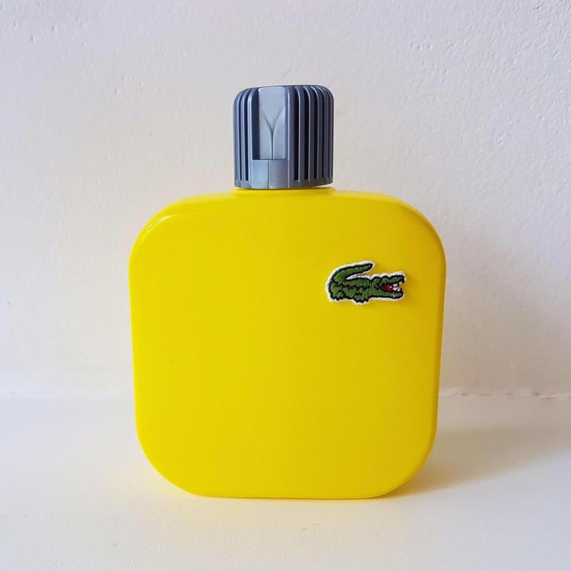 Лакоста желтая мужская. Lacoste Eau de Lacoste l.12.12 Yellow. Lacoste духи желтые. Лакост желтый.